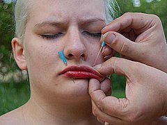 Outdoor Facial Needle Torture