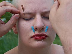 Outdoor Facial Needle Torture