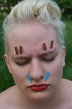 Outdoor Facial Needle Torture