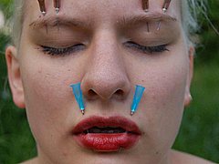 Outdoor Facial Needle Torture